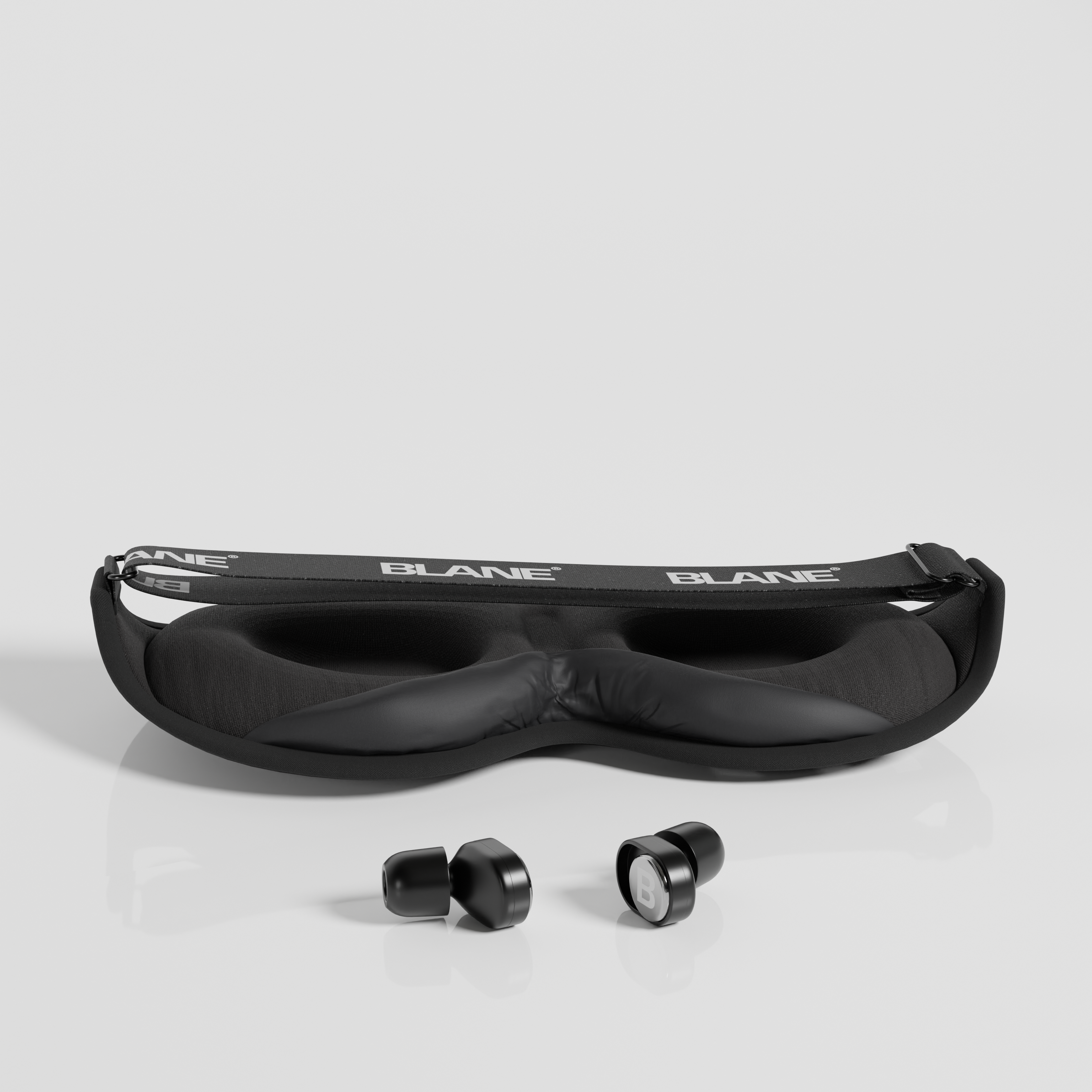 Masque de sommeil AbsoluteBlack et bouchons d'oreilles QuietPlugs sur fond blanc